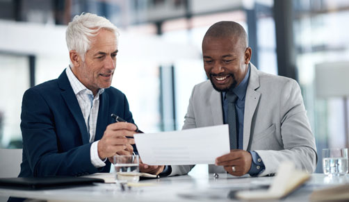 Men working together as partners