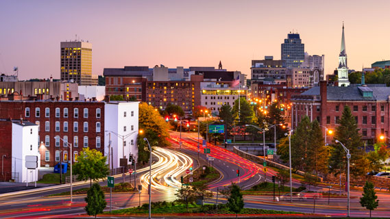 Massachusetts city skyline at dusk