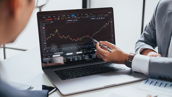 Trading charts on laptop